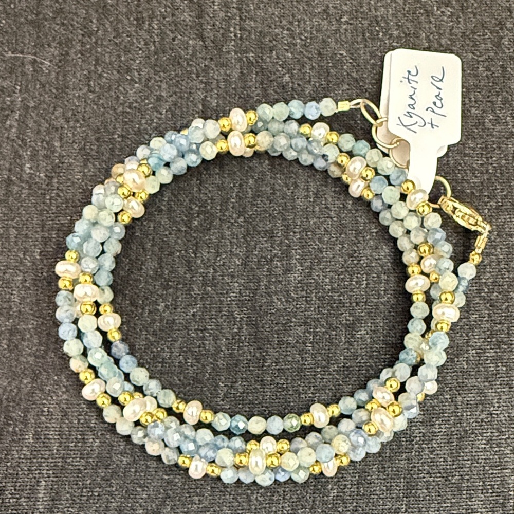 Wrap bracelet.  Faceted kyanite beads mixed with hematite and tiny pearls.